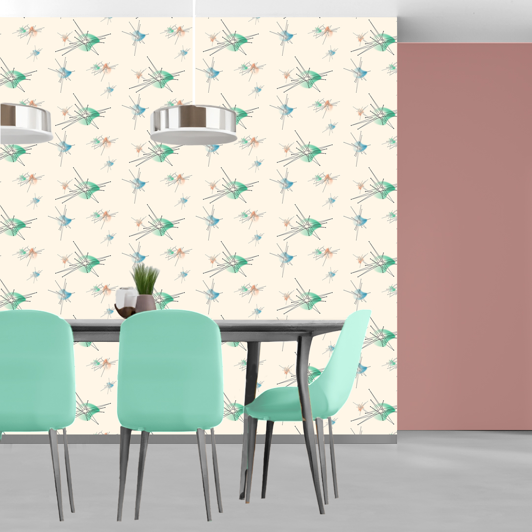 The artwork features a repeating geometric pattern of symmetrical shapes resembling elongated, curved diamonds or petals in various shades of blue and green. Each shape is split vertically with one half filled with a light blue and the other half filled with green or darker blue. The background is a light, almost pastel blue, which provides a soft yet vibrant backdrop. One of the blue shapes near the upper left contains a white starburst element, adding a focal point of brightness to the composition. The overall design conveys a modern, mid-century aesthetic with clean lines and harmonious color contrasts.